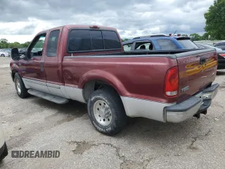 2000 Ford F-250 XL with VIN 1FTNX20S7YED38282, listed as a Copart auction lot 58748425 with 211,080 mi miles and Salvage title. Bid and sale history available at DreamBid. Image 2.
