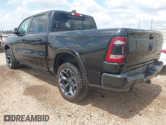 2023 Ram 1500 Limited with VIN 1C6SRFHT6PN541655, listed as a IAAI auction lot 42143725 with 52,793 mi miles and . Bid and sale history available at DreamBid. Image 3.