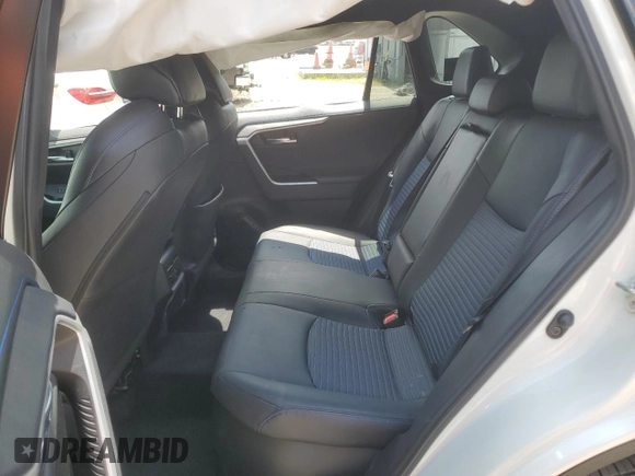 2021 Toyota RAV4 Hybrid XSE with VIN 4T3E6RFV3MU061808, listed as a Copart auction lot 57048025 with 20,614 mi miles and Salvage title. Bid and sale history available at DreamBid. Image 11.