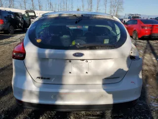 2015 Ford Focus Titanium with VIN 1FADP3N25FL325037, listed as a Copart auction lot 42248985 with 58,831 mi miles and Salvage Title. Bid and sale history available at carsss.com. Image 6.