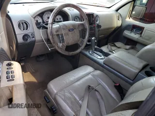 2006 Ford F-150 XLT with VIN 1FTPX12526NA21906, listed as a Copart auction lot 56587555 with 204,039 mi miles and Salvage title. Bid and sale history available at DreamBid. Image 8.