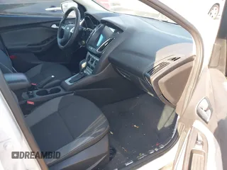 2014 Ford Focus SE with VIN 1FADP3K28EL386918, listed as a IAAI auction lot 42171974 with 118,098 mi miles. Bid and sale history available at carsss.com. Image 5.