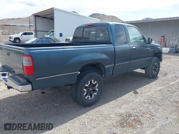 1996 Toyota T100 DX with VIN JT4UN22D9T0034196, listed as a IAAI auction lot 41969849 with 211,309 mi miles and . Bid and sale history available at carsss.com. Image 4.