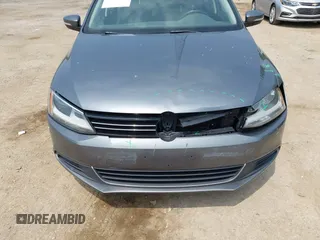 2013 Volkswagen Jetta SE with VIN 3VWBX7AJ3DM434661, listed as a IAAI auction lot 42505596 with 135,263 mi miles and . Bid and sale history available at DreamBid. Image 6.
