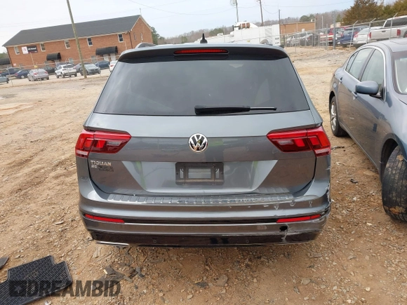 2020 Volkswagen Tiguan SE with VIN 3VV3B7AX7LM163193, listed as a IAAI auction lot 41751571 with 32,352 mi miles and . Bid and sale history available at DreamBid. Image 17.