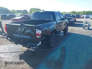 2023 Toyota Tacoma SR5 z VIN 3TYAZ5CN5PT036387, wystawiony jako IAAI lot #42077284 z przebiegiem 34 568 mil mil oraz . Historia ofert i sprzedaży dostępna na DreamBid. Obrazek 4.