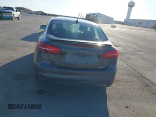 2016 Ford Focus SE with VIN 1FADP3F27GL374188, listed as a IAAI auction lot 41738121 with 125,229 mi miles. Bid and sale history available at carsss.com. Image 13.