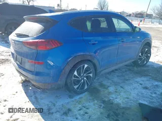 2019 Hyundai Tucson Sport with VIN KM8J33ALXKU857925, listed as a IAAI auction lot 41369786 with 41,365 mi miles. Bid and sale history available at carsss.com. Image 4.