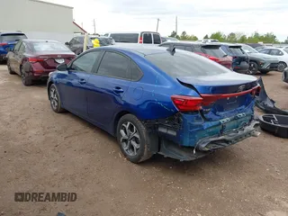 2021 Kia Forte LXS with VIN 3KPF24AD0ME288497, listed as a IAAI auction lot 41888110 with 71,646 mi miles and . Bid and sale history available at DreamBid. Image 3.