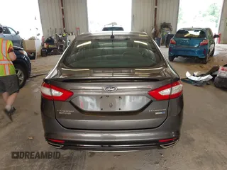 2016 Ford Fusion Titanium with VIN 3FA6P0D9XGR223354, listed as a IAAI auction lot 42621924 with Not provided miles and . Bid and sale history available at DreamBid. Image 16.