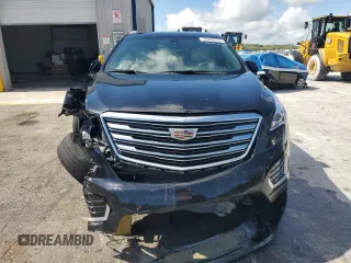 2019 Cadillac XT5 FWD with VIN 1GYKNARS9KZ219259, listed as a Copart auction lot 56900625 with 58,739 mi miles and Non repairable. Bid and sale history available at DreamBid. Image 5.