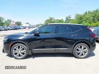 2022 Chevrolet Blazer Premier z VIN 3GNKBFRS4NS128999, wystawiony jako IAAI lot #42157919 z przebiegiem 79 639 mil mil oraz . Historia ofert i sprzedaży dostępna na DreamBid. Obrazek 14.