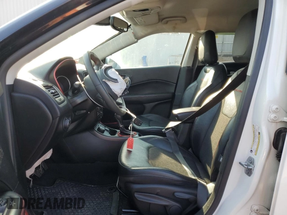 2021 Jeep Compass Trailhawk with VIN 3C4NJDDB2MT583833, listed as a Copart auction lot 58736675 with 67,090 mi miles and Salvage title. Bid and sale history available at DreamBid. Image 7.