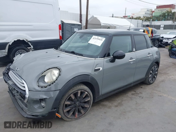 2015 MINI Hardtop 4 Door with VIN WMWXS5C57FT832162, listed as a IAAI auction lot 42159929 with 117,683 mi miles and . Bid and sale history available at DreamBid. Image 2.