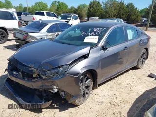 2019 Honda Civic Sport with VIN 19XFC2F88KE028035, listed as a IAAI auction lot 42000936 with 51,666 mi miles and . Bid and sale history available at DreamBid. Image 2.