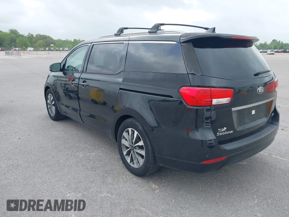 2015 Kia Sedona EX with VIN KNDMC5C11F6038255, listed as a IAAI auction lot 41968284 with 130,765 mi miles. Bid and sale history available at carsss.com. Image 3.