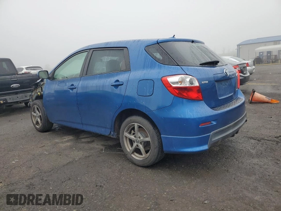 2009 Toyota Matrix S with VIN 2T1LE40E29C011912, listed as a Copart auction lot 57103465 with 128,900 mi miles and Salvage title. Bid and sale history available at DreamBid. Image 2.