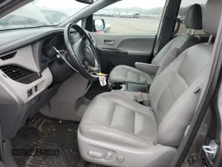 2017 Toyota Sienna XLE with VIN 5TDDZ3DC4HS187233, listed as a Copart auction lot 60227715 with 123,191 mi miles and Salvage title. Bid and sale history available at DreamBid. Image 7.
