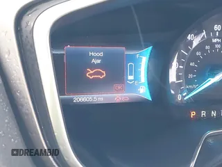 2014 Ford Fusion SE Hybrid with VIN 3FA6P0LU8ER283409, listed as a IAAI auction lot 40984629 with 206,605 mi miles. Bid and sale history available at carsss.com. Image 7.