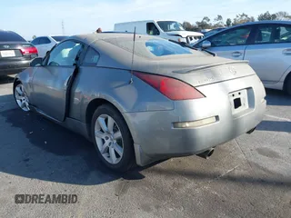 2004 Nissan 350Z Touring with VIN JN1AZ34E84T060682, listed as a IAAI auction lot 41616199 with 209,814 mi miles. Bid and sale history available at carsss.com. Image 3.