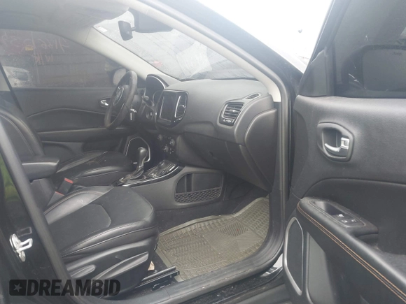 2020 Jeep Compass Limited with VIN 3C4NJDCB1LT146793, listed as a IAAI auction lot 41661239 with 91,148 mi miles and . Bid and sale history available at DreamBid. Image 5.