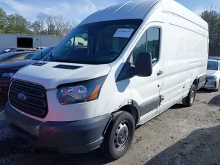 2018 Ford Transit with VIN 1FTYR3XM4JKA16579, listed as a IAAI auction lot 41560447 with 200,343 mi miles. Bid and sale history available at carsss.com. Image 14.