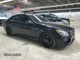 2014 Mercedes-Benz E 550 Sport with VIN WDDHF9BBXEA883116, listed as a Copart auction lot 50395055 with 124,022 mi miles and Clean Title. Bid and sale history available at DreamBid. Image 4.