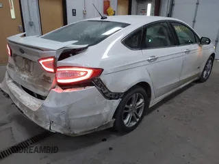 2016 Ford Fusion Titanium with VIN 3FA6P0SU8GR259163, listed as a IAAI auction lot 41812294 with 151,002 mi miles and . Bid and sale history available at DreamBid. Image 4.