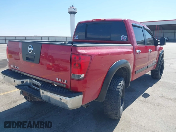 2007 Nissan Titan LE with VIN 1N6BA07B37N234320, listed as a IAAI auction lot 41912632 with 186,035 mi miles. Bid and sale history available at carsss.com. Image 4.