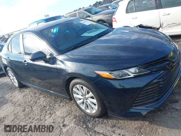 2019 Toyota Camry LE z VIN 4T1B11HK0KU759885, wystawiony jako IAAI lot #41684709 z przebiegiem 80 417 mil mil oraz . Historia ofert i sprzedaży dostępna na DreamBid. Obrazek 1.