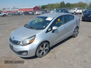 2014 Kia Rio EX with VIN KNADN4A34E6352924, listed as a IAAI auction lot 42072886 with 1 mi miles. Bid and sale history available at carsss.com. Image 2.