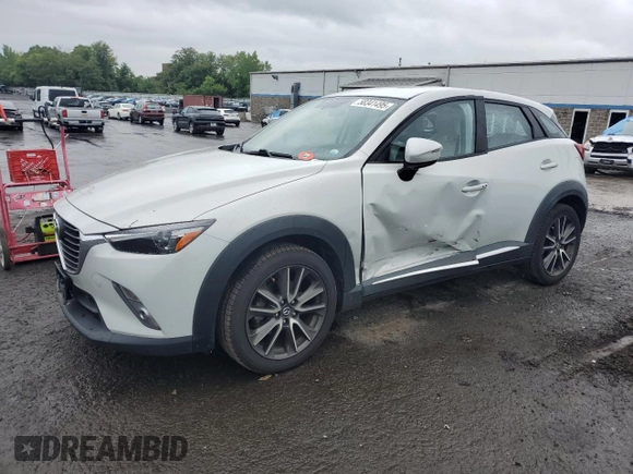 2016 Mazda CX-3 Grand Touring z VIN JM1DKBD77G0105451, wystawiony jako Copart lot #58341495 z przebiegiem 109 525 mil mil oraz Szkody całkowita. Historia ofert i sprzedaży dostępna na DreamBid. Obrazek 1.