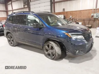 2021 Honda Passport Elite z VIN 5FNYF8H0XMB029484, wystawiony jako IAAI lot #42117909 z przebiegiem 42 244 mil mil oraz . Historia ofert i sprzedaży dostępna na DreamBid. Obrazek 1.