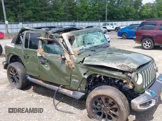 2023 Jeep Wrangler Sahara with VIN 1C4JJXP60PW556336, listed as a IAAI auction lot 39553199 with 10,437 mi miles and . Bid and sale history available at DreamBid. Image 6.