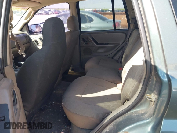 2002 Jeep Grand Cherokee Laredo с VIN 1J4GX48S42C287863, выставлен на аукционе IAAI как лот 41982433 с пробегом Не указан миль и . История ставок и продаж доступна на DreamBid. Изображение 8.