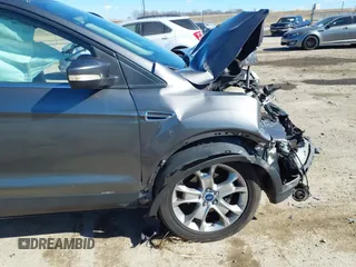 2013 Ford Escape SEL with VIN 1FMCU0HX2DUA51416, listed as a IAAI auction lot 41689474 with 140,596 mi miles and . Bid and sale history available at DreamBid. Image 6.