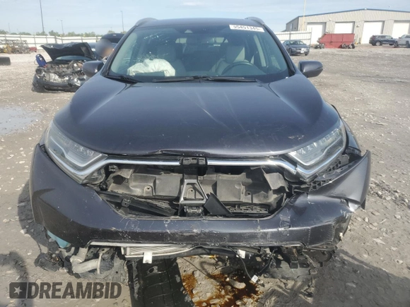 2018 Honda CR-V Touring z VIN 7FARW2H94JE077885, wystawiony jako Copart lot #55451345 z przebiegiem 133 964 mil mil oraz Szkoda całkowita • Salvage title. Historia ofert i sprzedaży dostępna na DreamBid. Obrazek 5.