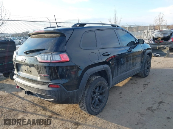 2022 Jeep Cherokee Trailhawk with VIN 1C4PJMBX7ND508267, listed as a IAAI auction lot 41356773 with 74,019 mi miles. Bid and sale history available at carsss.com. Image 4.