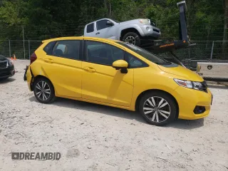 2018 Honda Fit EX с VIN 3HGGK5H89JM717562, выставлен на аукционе Copart как лот 60090475 с пробегом 70 544 миль миль и Списание • Salvage title. История ставок и продаж доступна на DreamBid. Изображение 4.