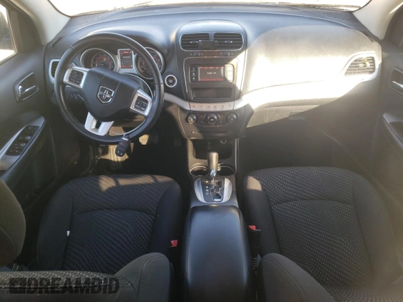 2017 Dodge Journey SXT with VIN 3C4PDCBB1HT569229, listed as a Copart auction lot 46286195 with 112,572 mi miles and Salvage Title. Bid and sale history available at DreamBid. Image 8.
