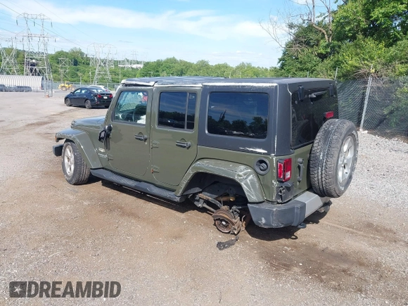 2015 Jeep Wrangler Unlimited Altitude z VIN 1C4HJWEG0FL752152, wystawiony jako IAAI lot #42311043 z przebiegiem 112 379 mil mil oraz . Historia ofert i sprzedaży dostępna na DreamBid. Obrazek 3.