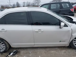 2011 Ford Fusion Hybrid with VIN 3FADP0L31BR316647, listed as a IAAI auction lot 41730126 with 162,354 mi miles. Bid and sale history available at carsss.com. Image 13.