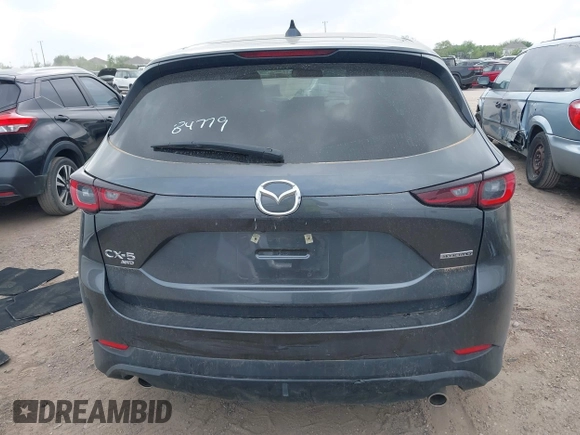 2023 Mazda CX-5 S Carbon Edition z VIN JM3KFBCM7P0226930, wystawiony jako IAAI lot #41939956 z przebiegiem 29 477 mil mil oraz . Historia ofert i sprzedaży dostępna na DreamBid. Obrazek 16.