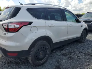2018 Ford Escape Titanium z VIN 1FMCU9J94JUD09141, wystawiony jako Copart lot #56625805 z przebiegiem Nie podano mil oraz Szkoda całkowita • Salvage title. Historia ofert i sprzedaży dostępna na DreamBid. Obrazek 3.