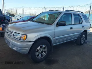 2001 Isuzu Rodeo S with VIN 4S2CK58W614361048, listed as a IAAI auction lot 41681566 with 133,460 mi miles and . Bid and sale history available at DreamBid. Image 17.