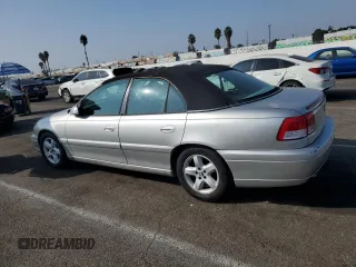 2000 Cadillac Catera z VIN W06VR54R1YR003905, wystawiony jako Copart lot #76417144 z przebiegiem 80 894 mil mil oraz Tytuł czysty. Historia ofert i sprzedaży dostępna na DreamBid. Obrazek 2.