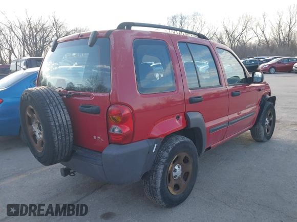 2003 Jeep Liberty Sport with VIN 1J4GL48K33W729642, listed as a IAAI auction lot 41826761 with 196,989 mi miles. Bid and sale history available at carsss.com. Image 4.