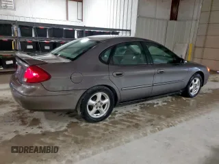 2002 Ford Taurus SES Standard z VIN 1FAFP55U72A161401, wystawiony jako Copart lot #55893125 z przebiegiem 128 258 mil mil oraz Czysty tytuł • Clean title. Historia ofert i sprzedaży dostępna na DreamBid. Obrazek 3.