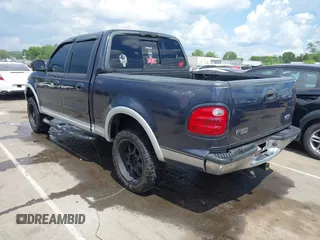 2001 Ford F-150 XLT z VIN 1FTRW08LX1KD56482, wystawiony jako IAAI lot #42155153 z przebiegiem 340 009 mil mil oraz . Historia ofert i sprzedaży dostępna na DreamBid. Obrazek 3.
