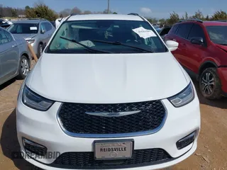 2022 Chrysler Pacifica Touring L with VIN 2C4RC1BGXNR132615, listed as a IAAI auction lot 41643983 with 45,717 mi miles and . Bid and sale history available at DreamBid. Image 12.